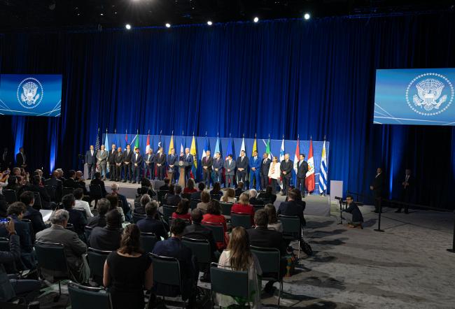 A number of intergovernmental processes play crucial roles in fostering cooperation, dialogue, and collaboration among countries to address migration challenges and promote the rights and well-being of migrants and refugees within their respective regions. In the photo, national delegates at an intergovernmental meeting.